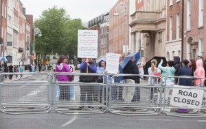7/7/2015. Dail Protest. A number of people protested a the Dail today in relation to alleged garda incompetence in investigating a range of cases involving the death of family members. According to spokes person Mari Maxwell (086 236 3706), from Inverin in Connemara, there are 319 cases before the Review Panel of the Department of Justice involving claims ranging from elder abuse to drowning. Ms. Maxwell who is involved with Justice for All said that they were getting no response from the Department of Justice, even though the files were handed over there from the Taoiseach Enda Kenny T.D. Photo shows: Protesters outside Lenister House.Photo: RollingNews.ie